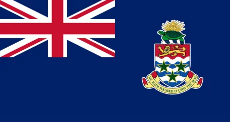 A blue field with the Union Jack in the canton, featuring the territorial shield on a white disc (or white outline). 