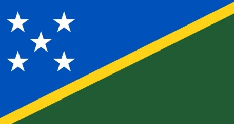 Solomon Islands flag: A blue field with a yellow diagonal stripe and green below it, featuring five white stars in the blue canton.